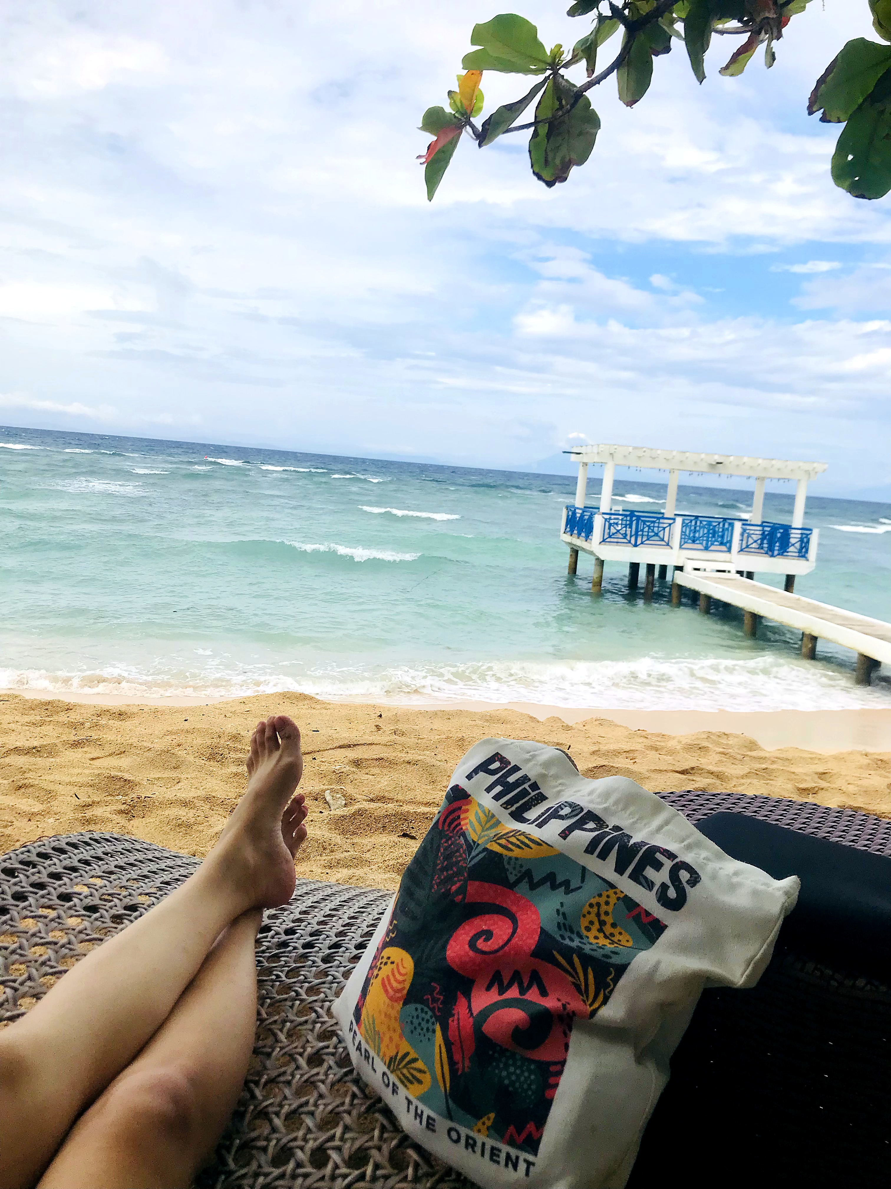 Feet up on the beach, taking a break
